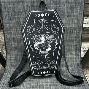 Black Coffin Backpack with White Skull Design
